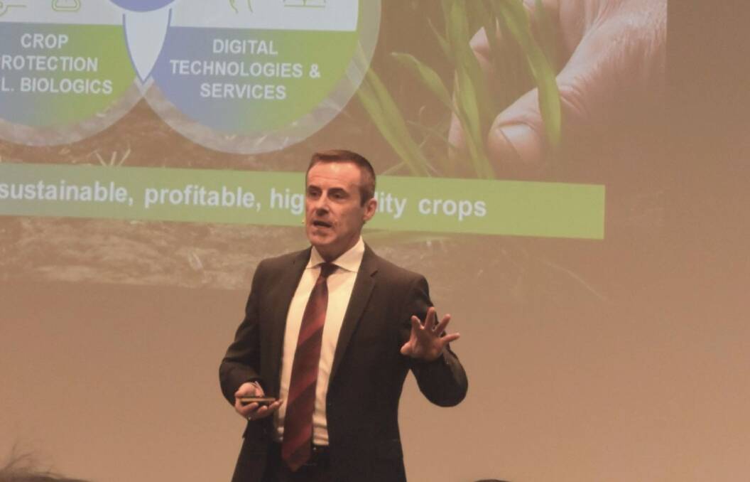 Bayer CropScience division head Liam Condon addresses international media in Monheim, Germany this week, telling them the regulator's investigation into the Monsanto merger was delayed.