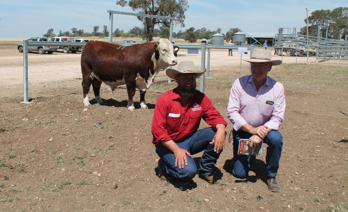 Devon Court Herefords principal Tom Nixon with long-standing client Ian Galloway, Cootharaba Hereford stud, Roma who paid the $13,000 top money for Devon Court Advance L64.