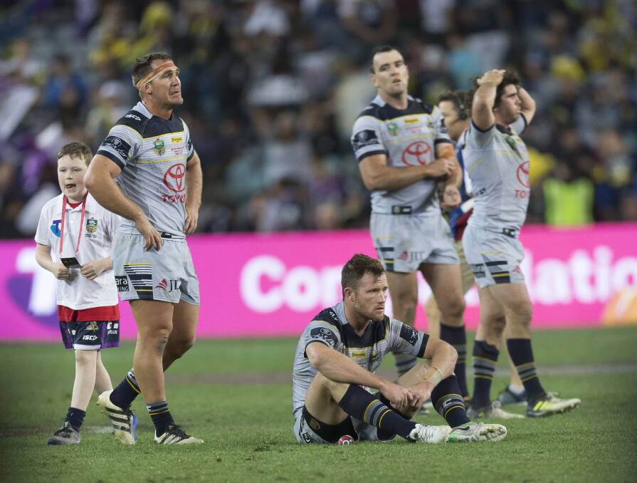 North Queensland Cowboys at full time. Photo: AAP Image/Craig Golding.