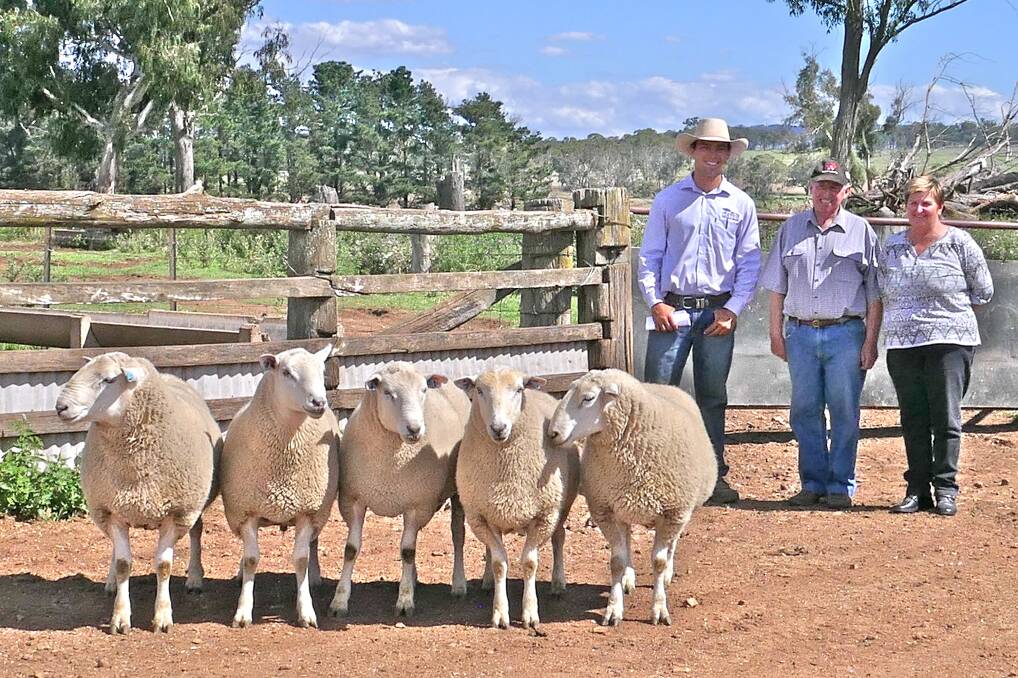 Vendor Sam Gates with purchasers of top priced lots Tony and Julie Partridge at the Gates Performance Genetics sheep sale.