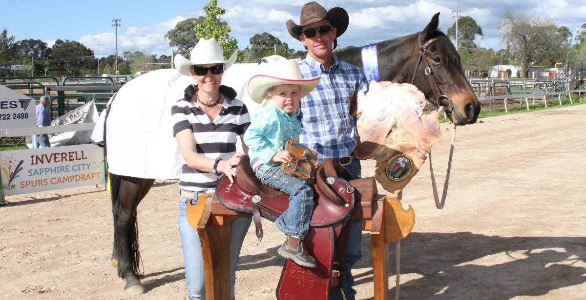 INVERELL WINNERS: Jason O’Neill and Sassy in the Peel Gainey Memorial Maiden Campdraft. Pictured with his wife Rachel and daughter. - Picture: Jodie Adams