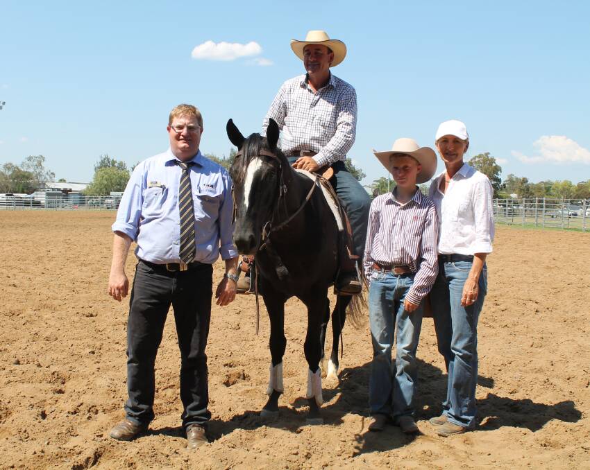 GDL auctioneer Mark Duthie with the $15,000 top-priced colt, Bobadil Blackout, with vendors Richard and Suzy Kelaher and Scott Wells, Bobadil, Tamworth NSW.