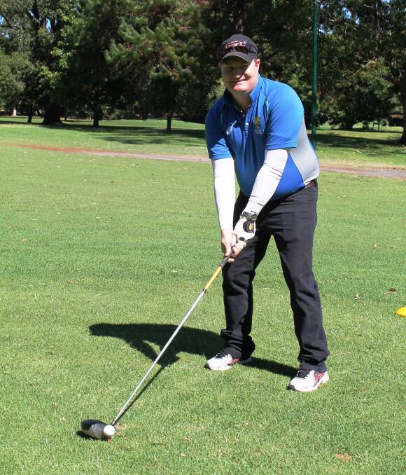 BIG SWING: Mark Duthie, GDL, Dalby, prepares to tee off at the Genomix golf day at the Toowoomba City Golf Club.