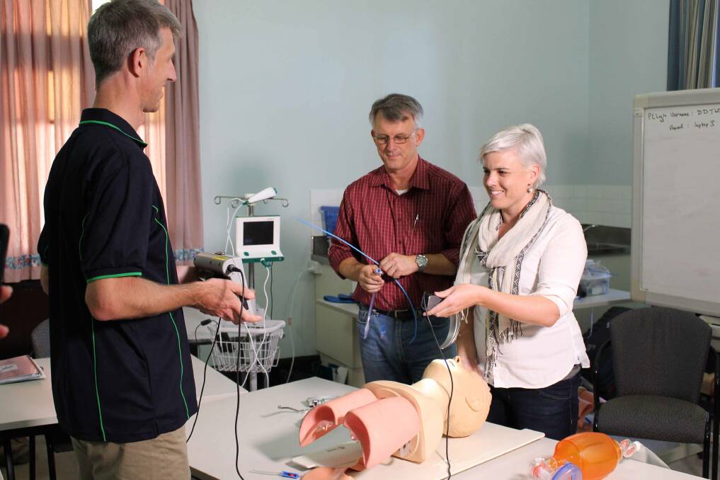 HEAD START: Dr Helen Fraser takes part in advanced skills anaesthetics training as Dr James Telfer (left) and Dr Mark Gibbs from the Rural Generalist Pathway look on.
