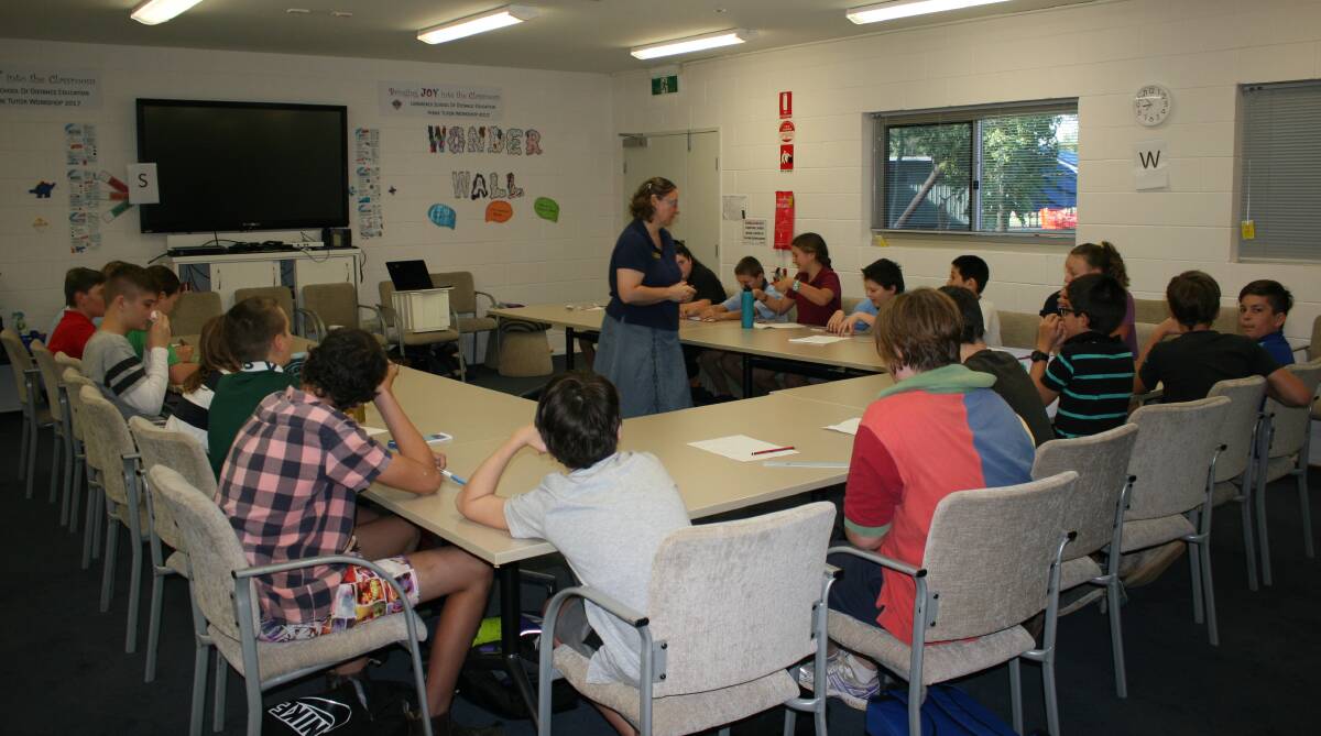 Year 7 Maths students and their teacher Mrs Owczarek enjoy the experience of sitting in a classroom face to face.