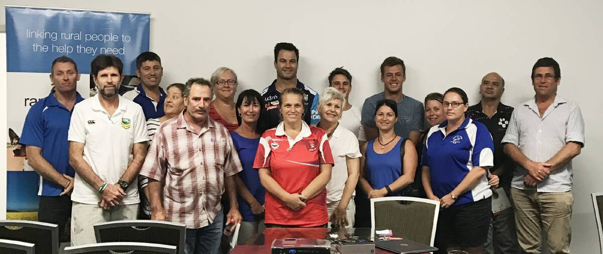 David Shillington (back) with Grafton mental health professionals and members of the South Grafton Rebels and the Grafton Ghosts.