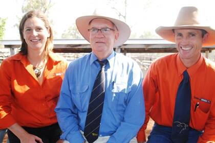 Alice and Rick Greenup, Greenup and Eidsvold Station Santa Gertrudis studs, with Bill Till, GDL, Toowoomba, after their sale at the Eidsvold TopX Saleyards last week.