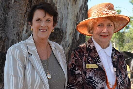 Gayle Taylor, Brisbane, enjoys the chance to reminisce with old friend Dot Hamilton, Eidsvold.