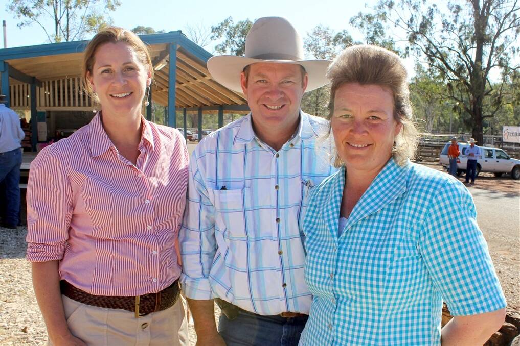 Alice Greenup with the volume buyers Brendan and Fiona Kemp, Carramah, Capella, who finished with five bulls to average $4200.