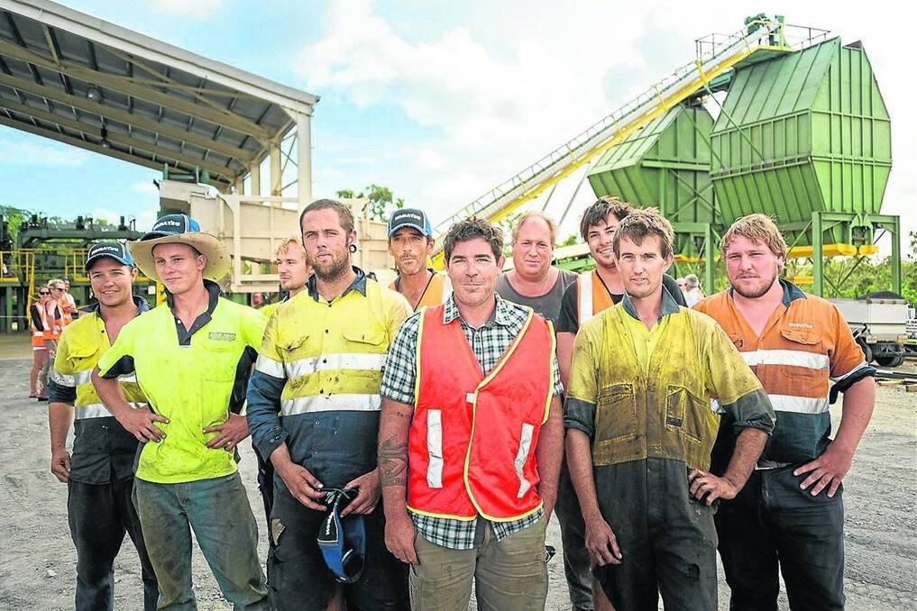 Workers at the newly opened sawmill near Yeppoon include, from left, front row: Rene Schipper, Aaron Johnstone, managing director Brendon O’Connor and Mark Lade, while at the rear, from left: Beau Zonierczak, Patrick Slowitzsky, Brad Jones, Clinton Amos, Taylor Shadbolt, and Sam Amos.