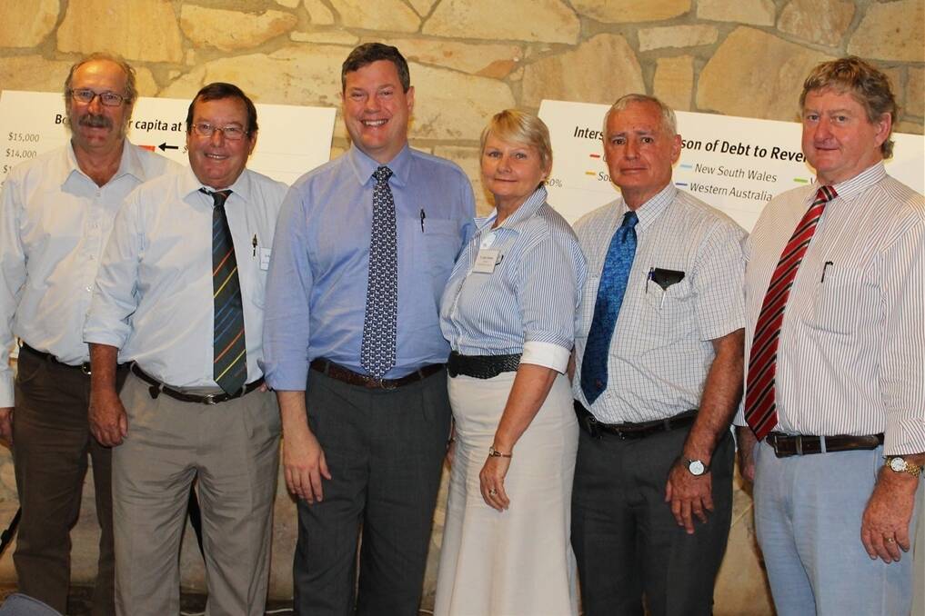 Treasurer Tim Nicholls (centre) and Member for Gregory, Vaughan Johnson with western Queensland mayors at Longreach.