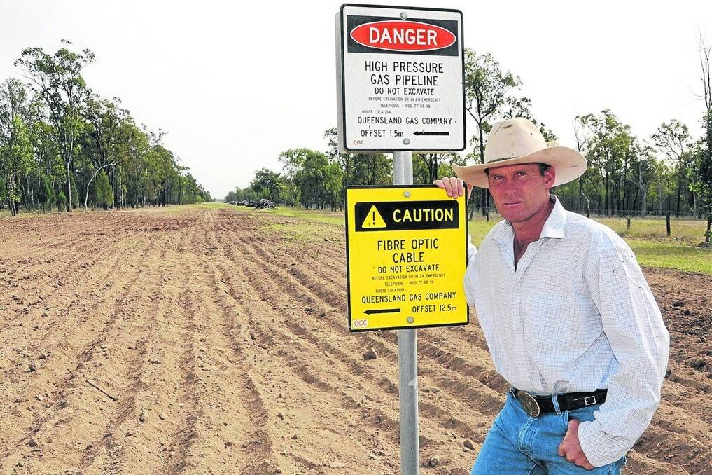 Kane Booth on the pipeline easement through his property Bentleigh, Chinchilla. The trench was backfilled in 2012 and 2013, and a layer of top fill was added in May.