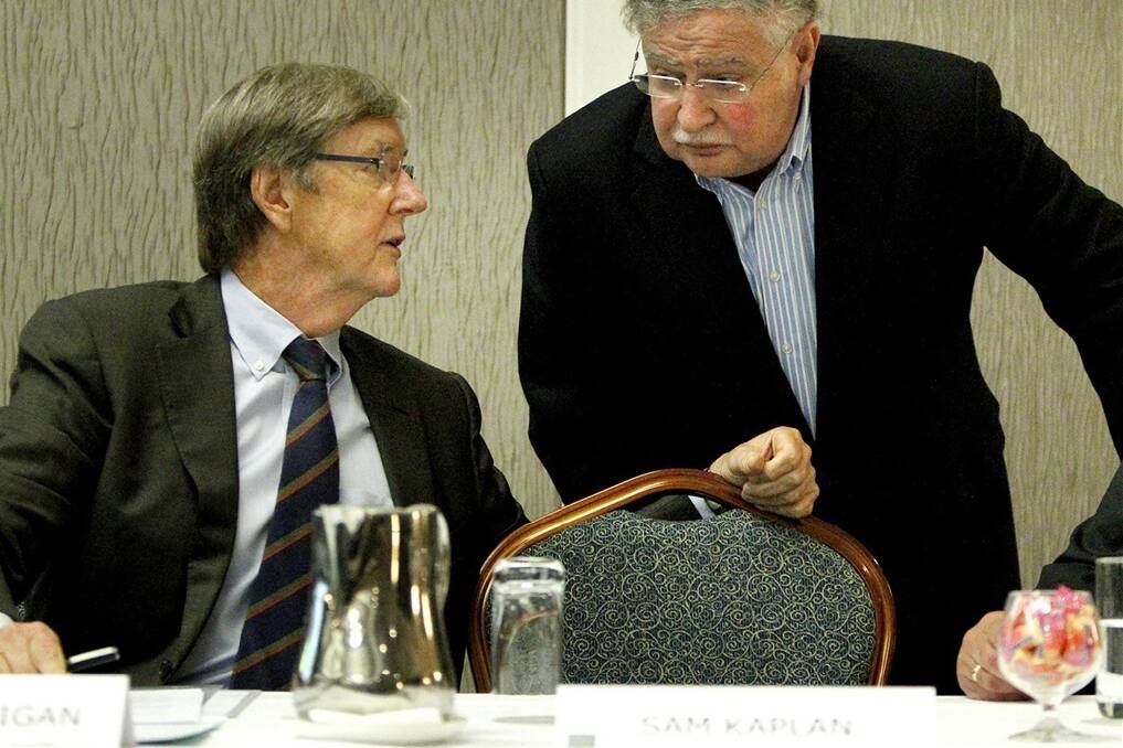 Qube chairman Chris Corrigan (left) talks with deputy chairman Sam Kaplan.