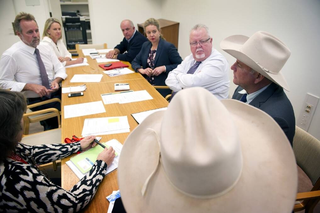 Gulf cattleman Barry Hughes, with Hughenden’s Rob Atkinson (left) in talks with the Nationals Senate team in Canberra on Monday.