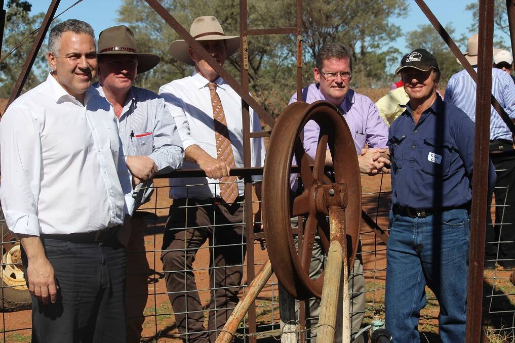 Federal Treasurer Joe Hockey, Federal Agriculture Minister Barnaby Joyce, National Farmers Federal (NFF) president Brent Finlay, Queensland Agriculture Minister John McVeigh and Charleville beef producer, Kelvin Rule, during a tour of the Rule’s property Vera Park. 