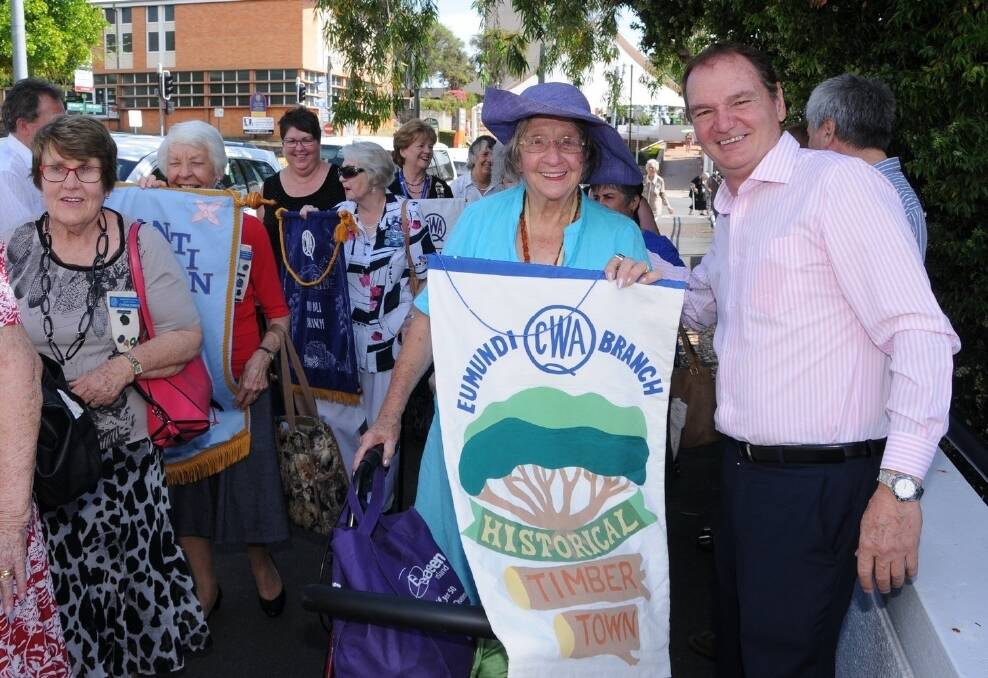 Ipswich Mayor Paul Pisasale greets QCWA delegates as they parade in for state conference. Cr Pisasale is pictured with Eumundi branch member Flo Saunders. -Picture: SARAH COULTON