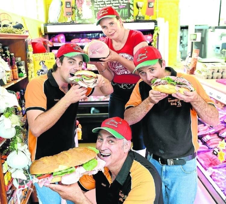 Mark Nolan, Trent Wolf, Michael Needham and Sabra Smith of Gray's Modern Meats, Toowoomba, celebrate winning Queensland Ham of the Year.