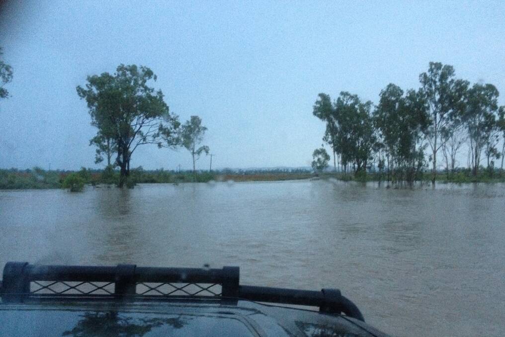 Flash flooding cut off the Bettafield driveway overnight thanks to a whopping 180mm. <i>- Picture: TIM BROSNAN.</i>