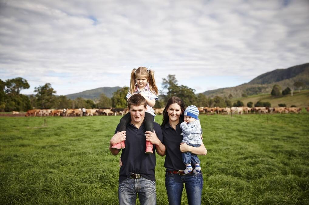 South-east Queensland dairy farmers Chad and Carita Parker and their family.