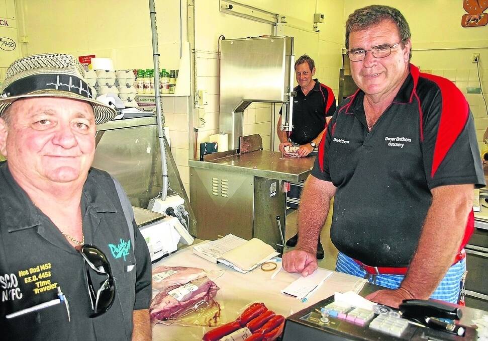 Regular customer Peter Peirano, Peter Jepson (back) and David Dwyer of Dwyer Brothers Butchers in Rockhampton. They can no longer get local beef for their customers.