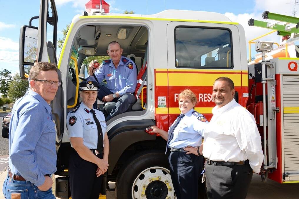 Origin Natural Resource Management agricultural property group manager Scott Cowley, Miles, and QGC Upstream Operations general manager Richard Schokman, Chinchilla, discussing the new communiction towers with QFES acting commissioner Katarina Carroll, QFES Miles Auxiliary captain Ray Duncombe, and QFES regional communications manager Gail Moran, Toowoomba. <i> - Picture: SARAH COULTON.</i>