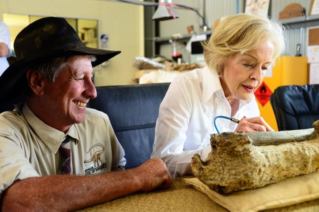 Quentin Bryce working on uncovering a dinosaur bone in the laboratory at AAOD. <i>- Picture: John Elliott.</i>
