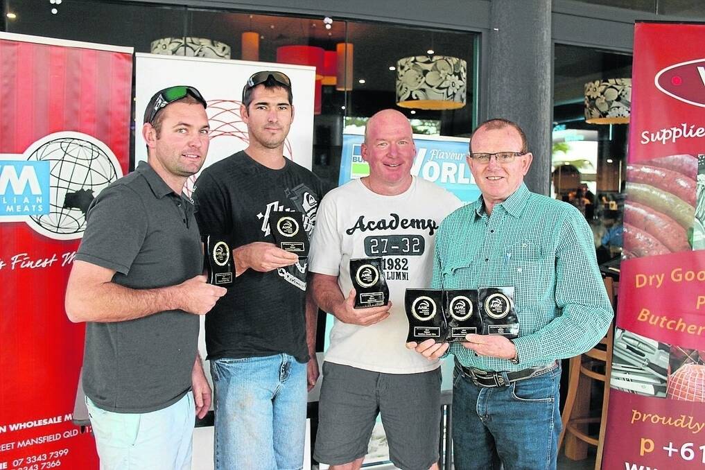 Holding their Capricornia Sausage King trophies are Dan Miller of Millers Meats, Monto, Scot Avis, manager of Kin Kora Meats, Gladstone, Jason O'Loughlin of Fair Dinkum Meats, Springsure and Tim Duggan from Mundubbera Butchering Company. - <i>Picture: HELEN WALKER.</i>