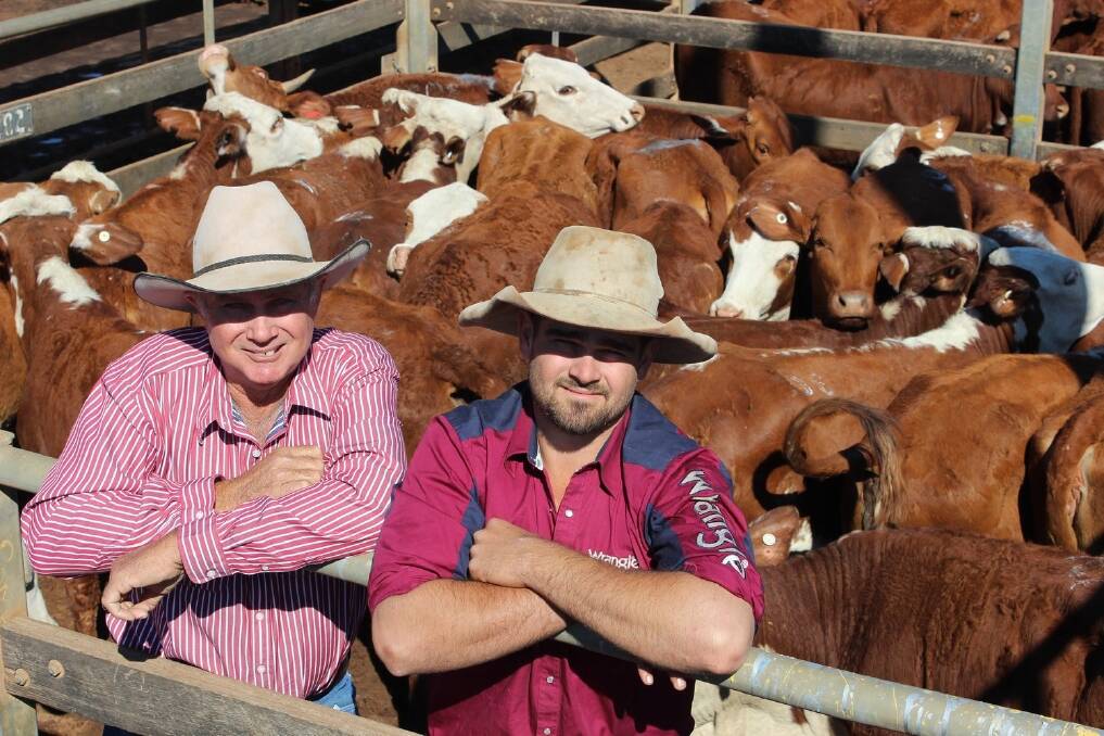 Noel and Nathan Dickson, who travelled from the family’s property, The Lake, 70km north east of Aramac to see their Braford steers and heifers sell at Roma on Tuesday.