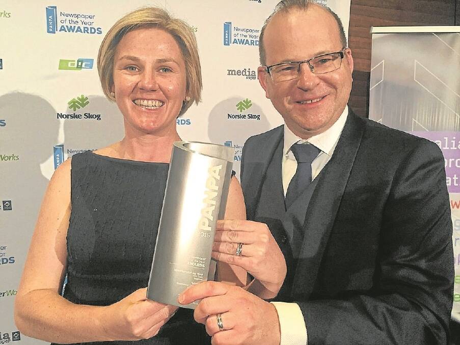 QCL’s editor Penelope Arthur and former QCL editor, now group managing editor Qld/NT, Brad Cooper, collect the PANPA Newspaper of the Year Award.