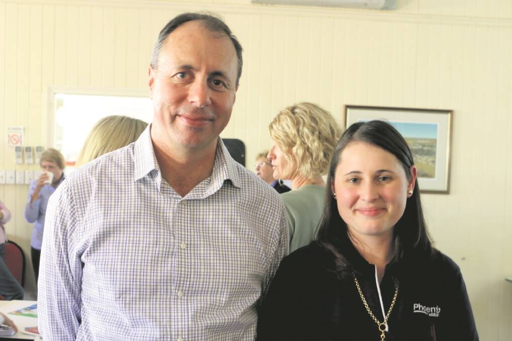 Kerrie-Lyn Rae, with  financial adviser Brad Sewell, loved being back in her home town of Blackall with practical advice to manage finance in drought times.