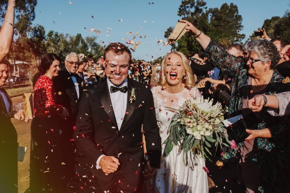 JUST MARRIED: Ross and Ingrid Uebergang after their wedding at the bride's hometown of Blackall. <i>Picture: EDWINA ROBERTSON PHOTOGRAPHY.</i>