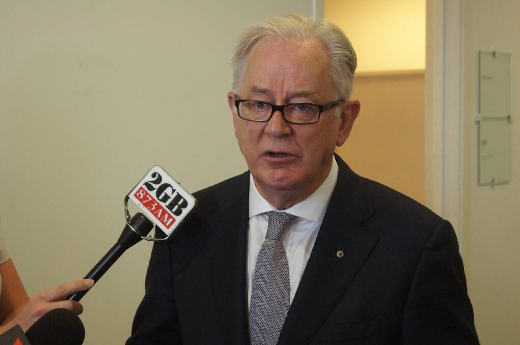 Federal Liberal MP and Trade and Investment Minister Andrew Robb speaking to press gallery media today in Canberra.