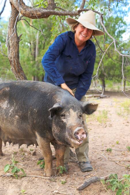 Lucy House with one of the sows. 