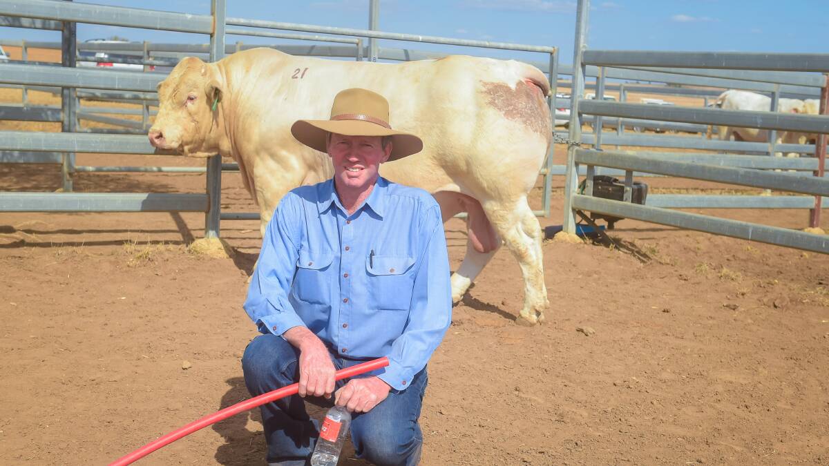 Vendor David Case with Ary RE’s Anchor, who sold over the phone for $16,000 to Bryce Godfrey, Lanifee, Winton. 