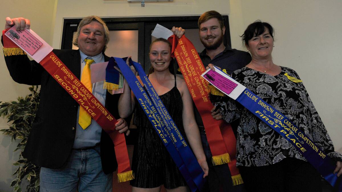 Geoff, Bonnie, Guthrie, and Alison Maynard with their winning ribbons from the carcase competition. 