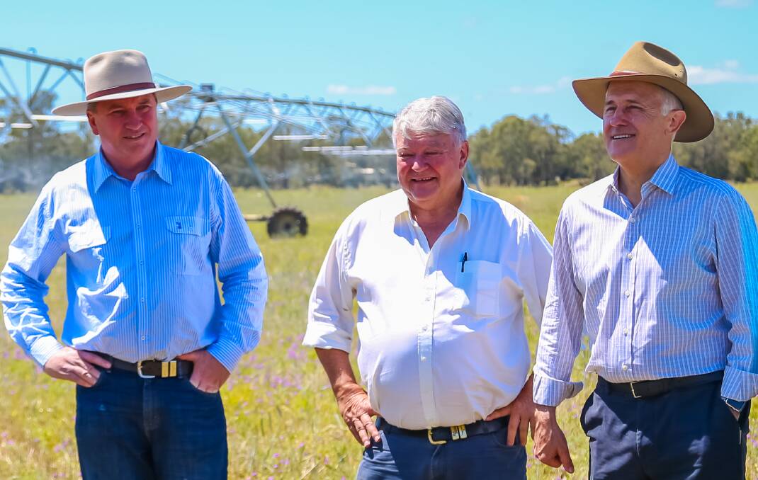 Federal Member for Flynn Ken O'Dowd stands between Deputy PM Barnaby Joyce (left) and PM Malcolm Turnbull. Photo - Kelly Butterworth. 