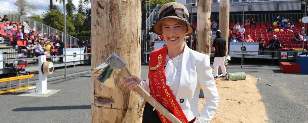 CHOPPING SHOWGIRL: Queensland Country Life Miss Showgirl 2016 runner-up Chloe Maxwell is an accomplished woodchopper at state, national and international levels. 