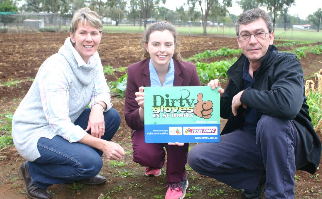 Oakey State High School Ag Science Teacher Deb Goudie, Student Council President Louise Donohoe are thrilled to receive a $1,000 grant from Total Tools Toowoomba Managing Director David Bosman.

