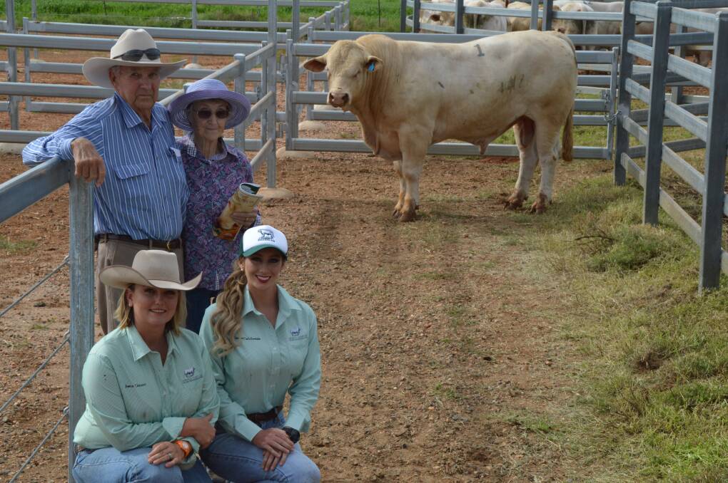 Top price buyers Bill and Margaret Roberts, Ridgelands, Injune, with Fairfield Charolais' leading ladies Jessie Chiconi and Alexandra Hindle Hernandez, and top priced bull Fairfield Karamel.
