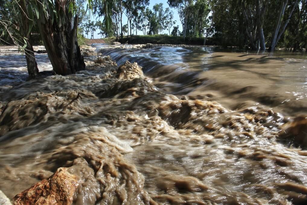  
The Suttor River, 45 minutes south of Mt Coolon, comes rushing down after good rainfall prior to Cyclone Debbie. The long awaited rain has arrived at Pasha and Ulcanbah Stations. Picture: Paula Heelan. 