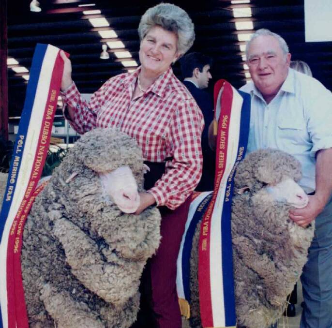 Proud achievements: Poss and Bill Peskett, Coban and Murrawondah Studs, Cunnamulla, with their grand champion pair Sam and Dimity at the 1996 Dubbo Show.  