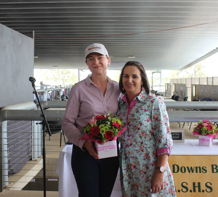 Sara Hales, receiving flowers in appreciation from Bec Ryan, Darling Downs Branch of the Australian Stock Horse Association. 