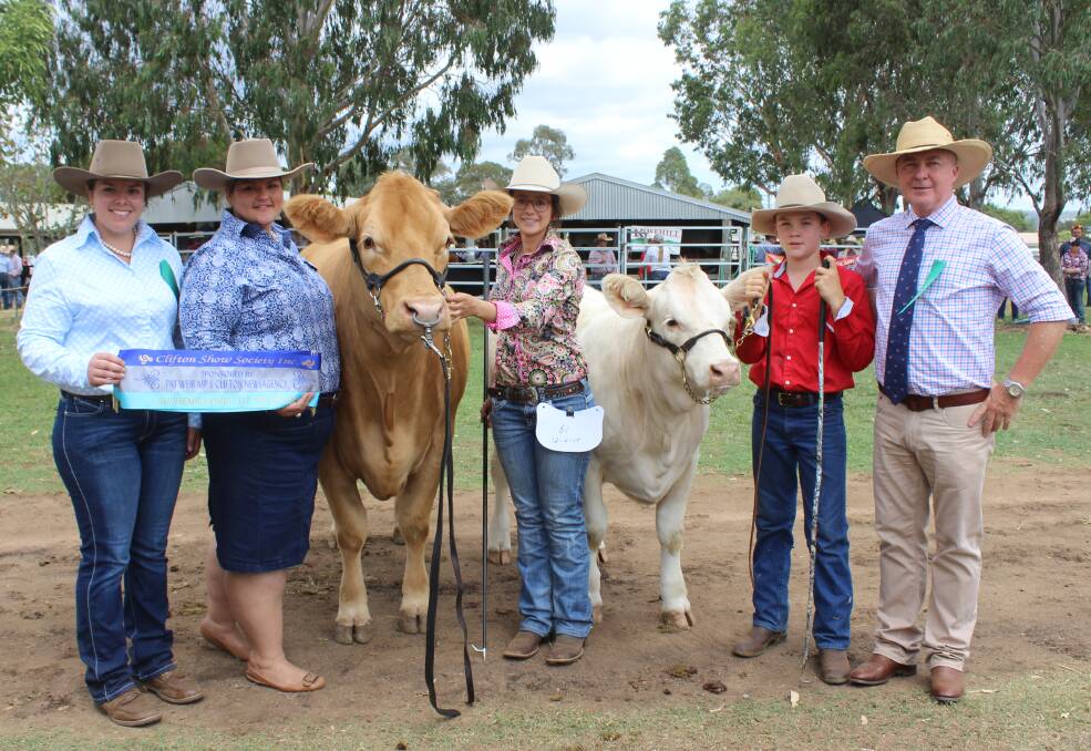 The supreme stud exhibit of the Clifton Show was the Charolais cow Moongoool Fan Mail, exhibited by Ivan Price and family, Moongool Charolais Stud, Surat. She is pictured  with judges Kathryn Trace, Tammy Robinson, and held by Amy Whitechurch, while holding the heifer calf at foot is Iva Price and judge Andrew Meara. 