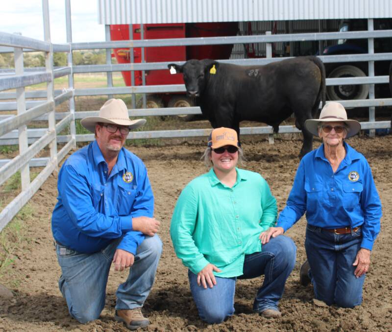 Sale topper Wallangra Taxi Driver T37, who sold for $20,000 is with Rhett Bonisch and his daughter Tylah Bonisch of Bonisch Cattle Company, Injune and stud principal Margaret Whip. Picture Helen Walker. 