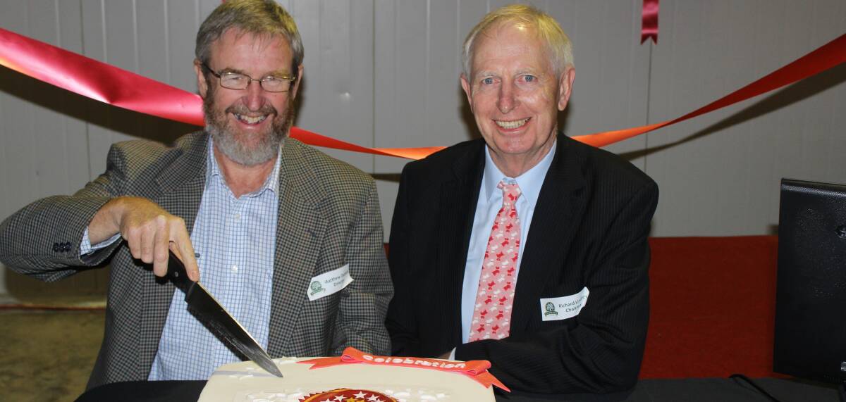 Stahmann Farm's Matthew Durack, together with chairman Richard Lindley, cut the cake to celebrate the Chinese e-commerce launch.