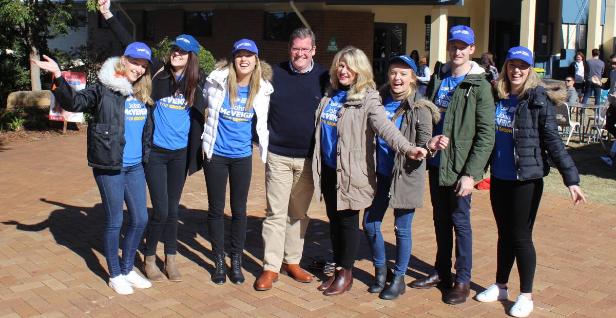 Dr John McVeigh surrounded by his wife Anita and his six voting-age children share in his elected status after winning the seat of Groom. Picture: Helen Walker