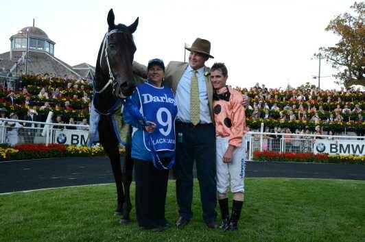 Peter Moody with strapper Donna Fisher, jockey Luke Nolen, and Black Caviar after one of her 25-straight wins.