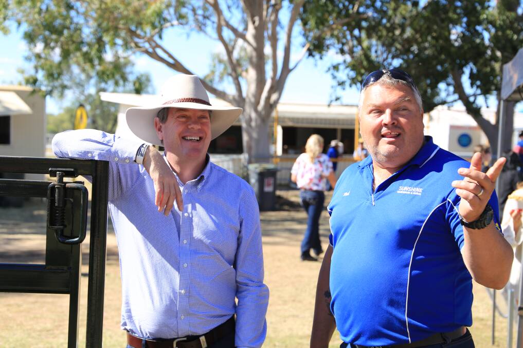 LNP Leader Tim Nicholls meeting Robert Watson from Sunshine Hardware and Rural at the Roma Show.