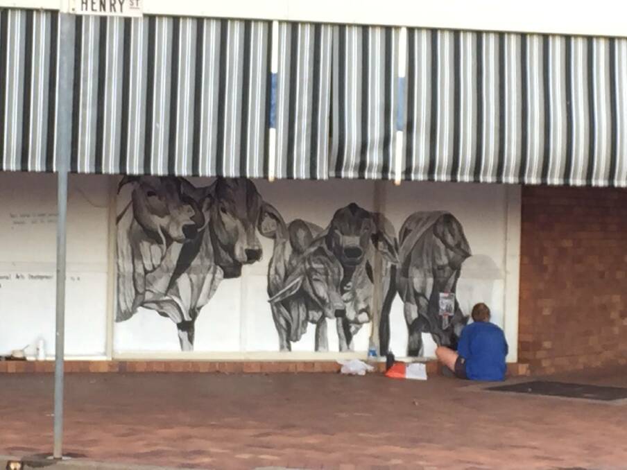 Jekka adding the finishing touches to her mural. Photo: Facebook