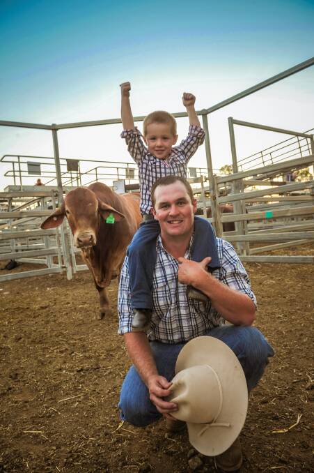 Archie and Adam Geddes, Oasis Droughtmasters, Emerald, with the top price bull from the Geddes family, Oasis Dundee. Picture: Kelly Butterworth